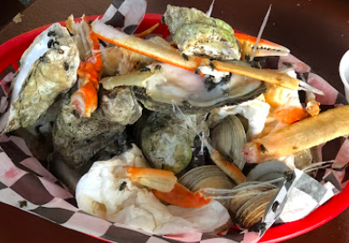 Duffy Street Seafood signature dishes Blackened Fish Bites
Steamed Oysters
Duffy Street Shrimp and Grits Platter